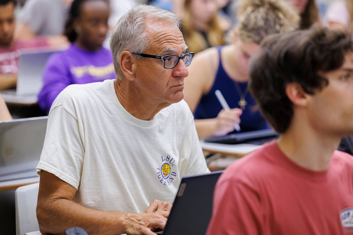 Kent Broussard in class Kent Broussard listens while in clas