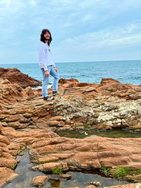 Tristan Ilgenfritz explores a rocky coastline.